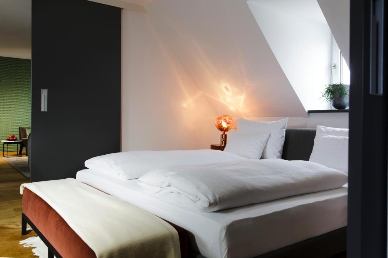 Hotel Maximilian'S اوغسبورغ المظهر الخارجي الصورة A bedroom