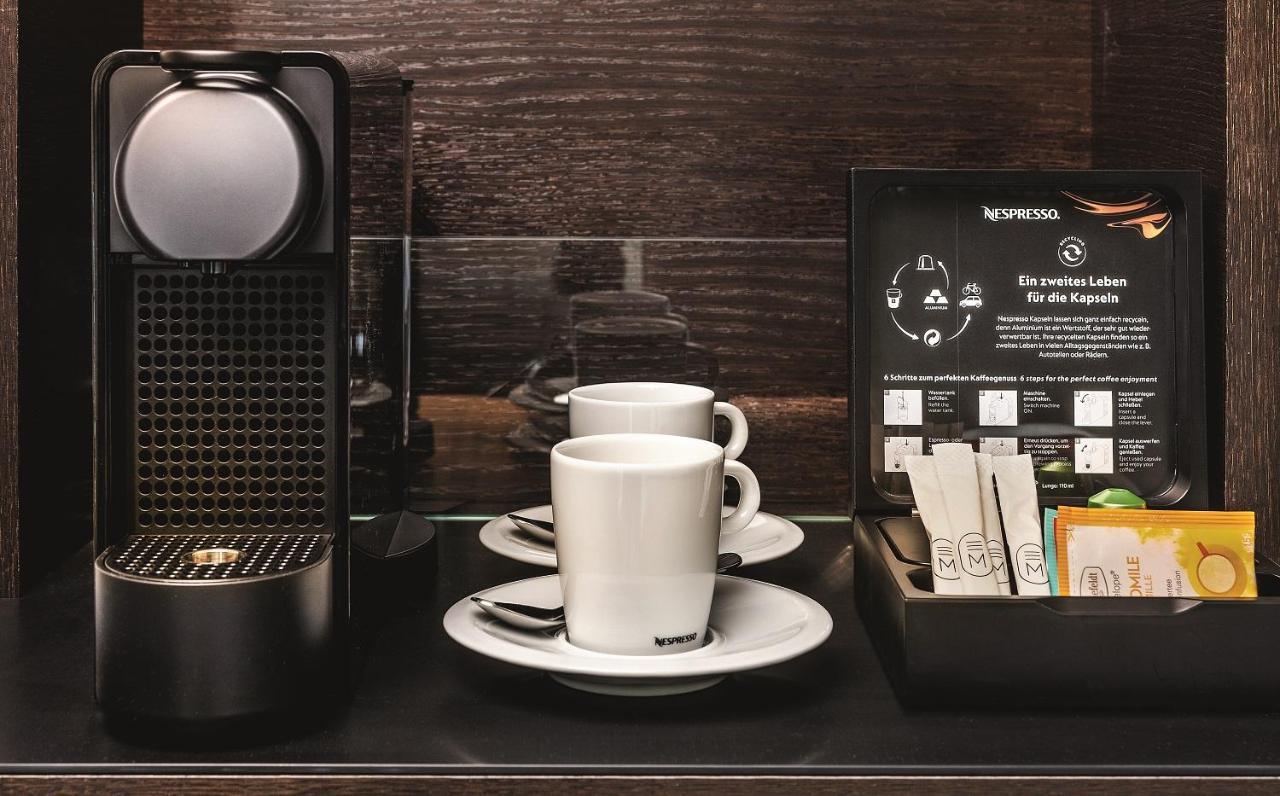 Hotel Maximilian'S اوغسبورغ المظهر الخارجي الصورة A Nespresso machine