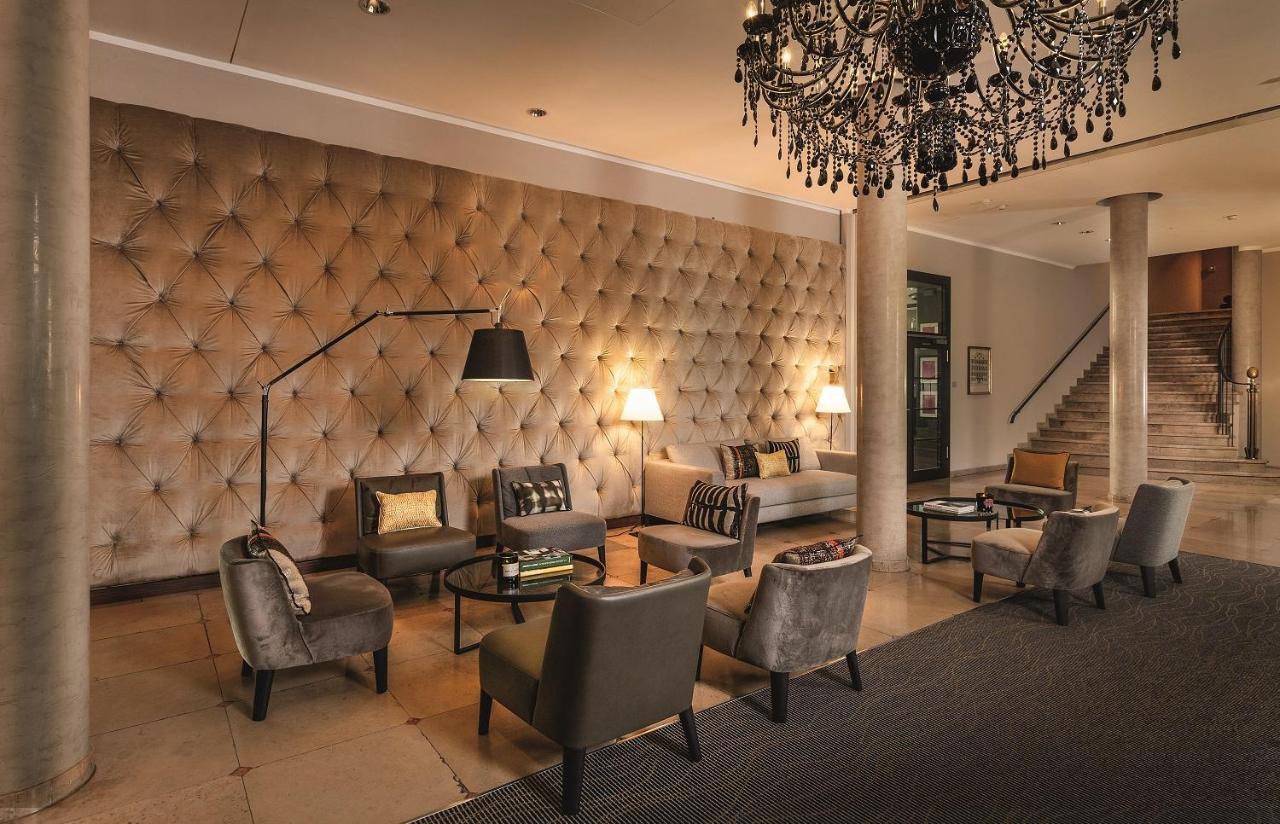 Hotel Maximilian'S اوغسبورغ المظهر الخارجي الصورة The lobby of the Hotel de la Paix