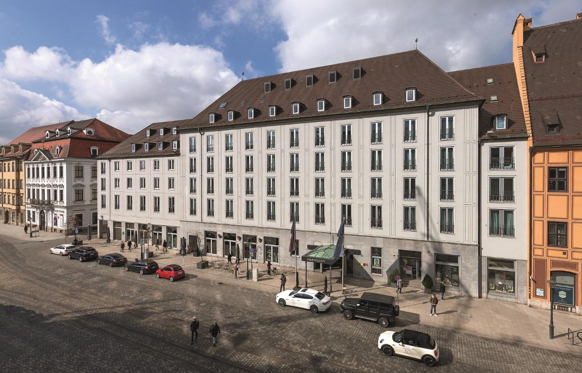 Hotel Maximilian'S اوغسبورغ المظهر الخارجي الصورة The former department store department store, today a hotel